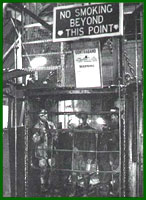The pit cage once used by miners now takes visitors underground